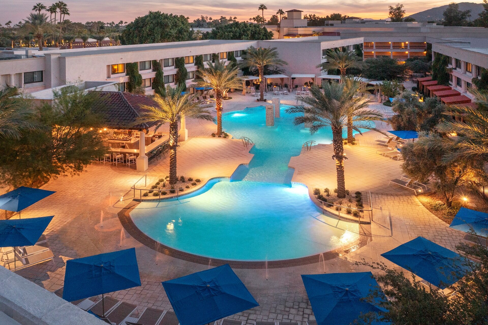 Destination resort pool at dusk